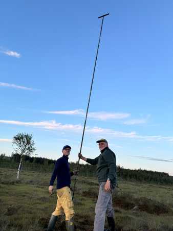 Michael and Martin taking a core sample